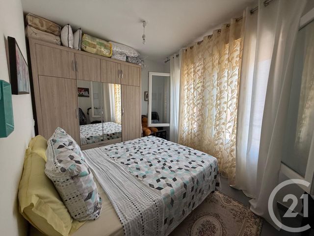 Afficher la photo en grand Appartement T3 à vendre - 2 pièces - 52.07 m2 - MENTON - 06 - PROVENCE-ALPES-COTE-D-AZUR - Century 21 Agence Molière